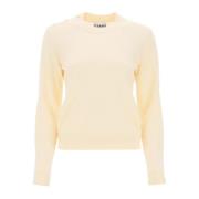 Sweater i merinould og cashmere med sommerfugleknapper