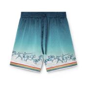 Blå Gradient Silke Shorts med Olympisk Kunst