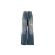 Bredbenet jeans med falmet vask og slid