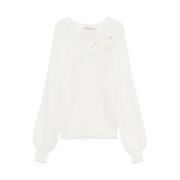 Ribstrikket sweater med blomsterapplikationer